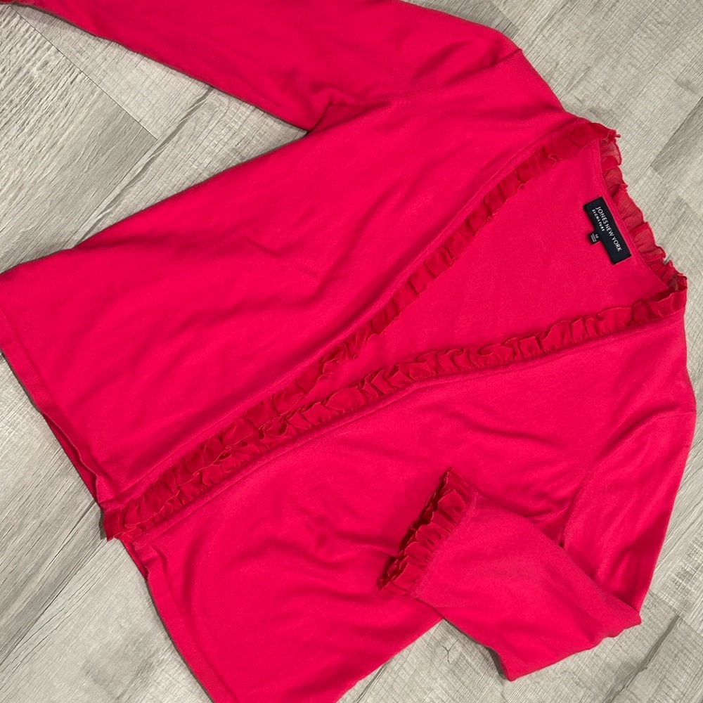 Coral colored cardigan with fun ruffles